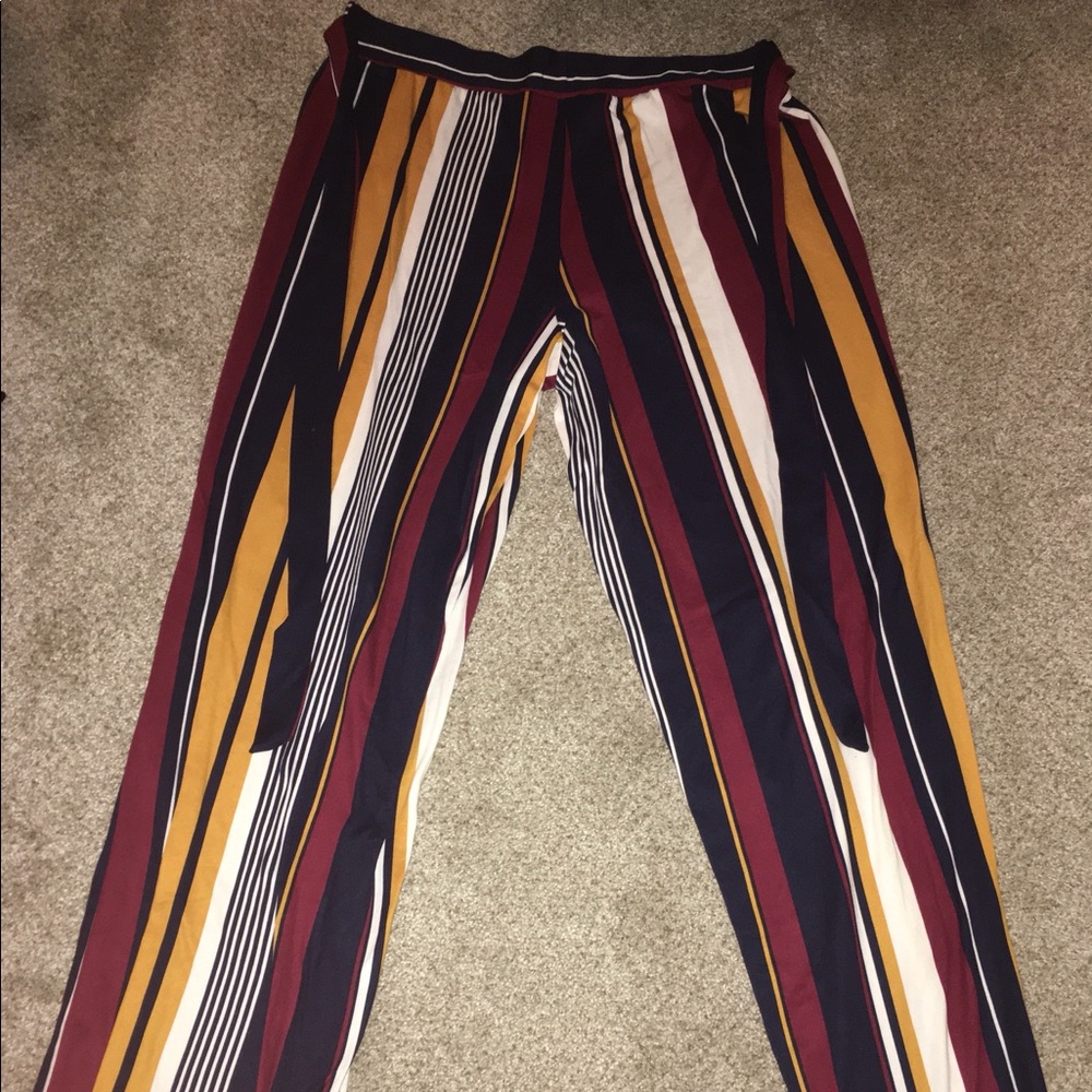 Striped, straight legged pants.